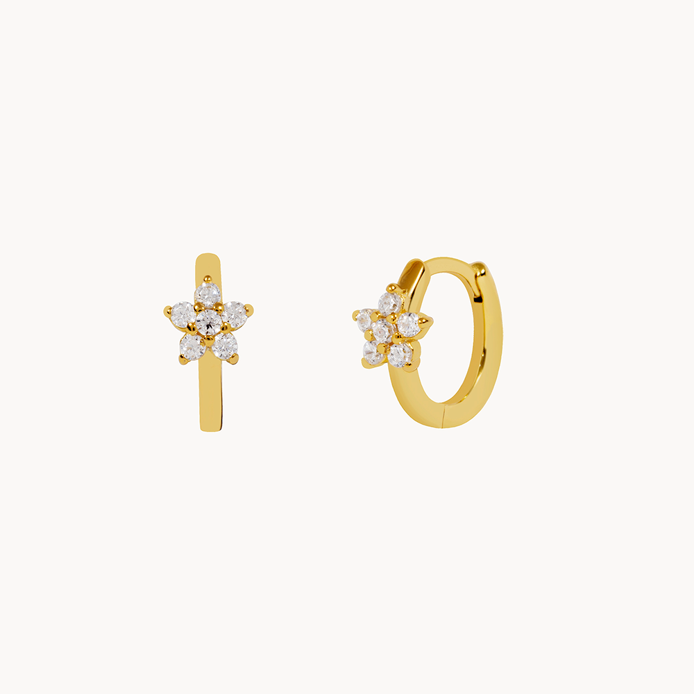 Women's Earring Showcasing an Embedded Star Design and Circular Stone Setting