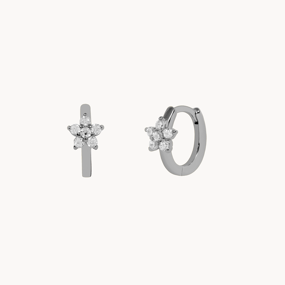 Women's Earring Showcasing an Embedded Star Design and Circular Stone Setting