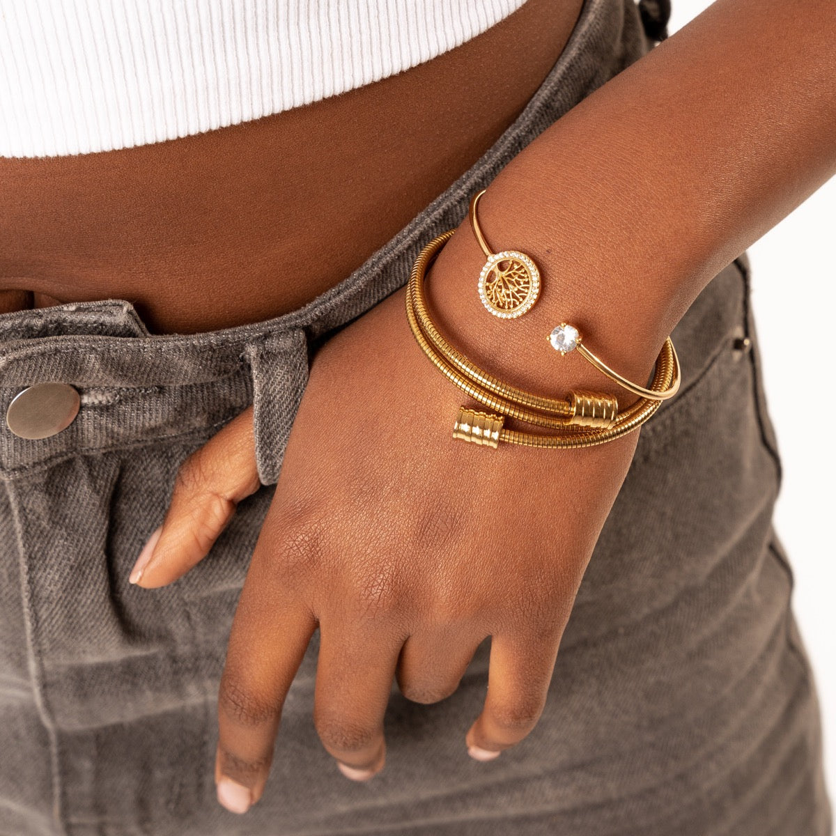 Angie – Bracelet with twisted design in gold