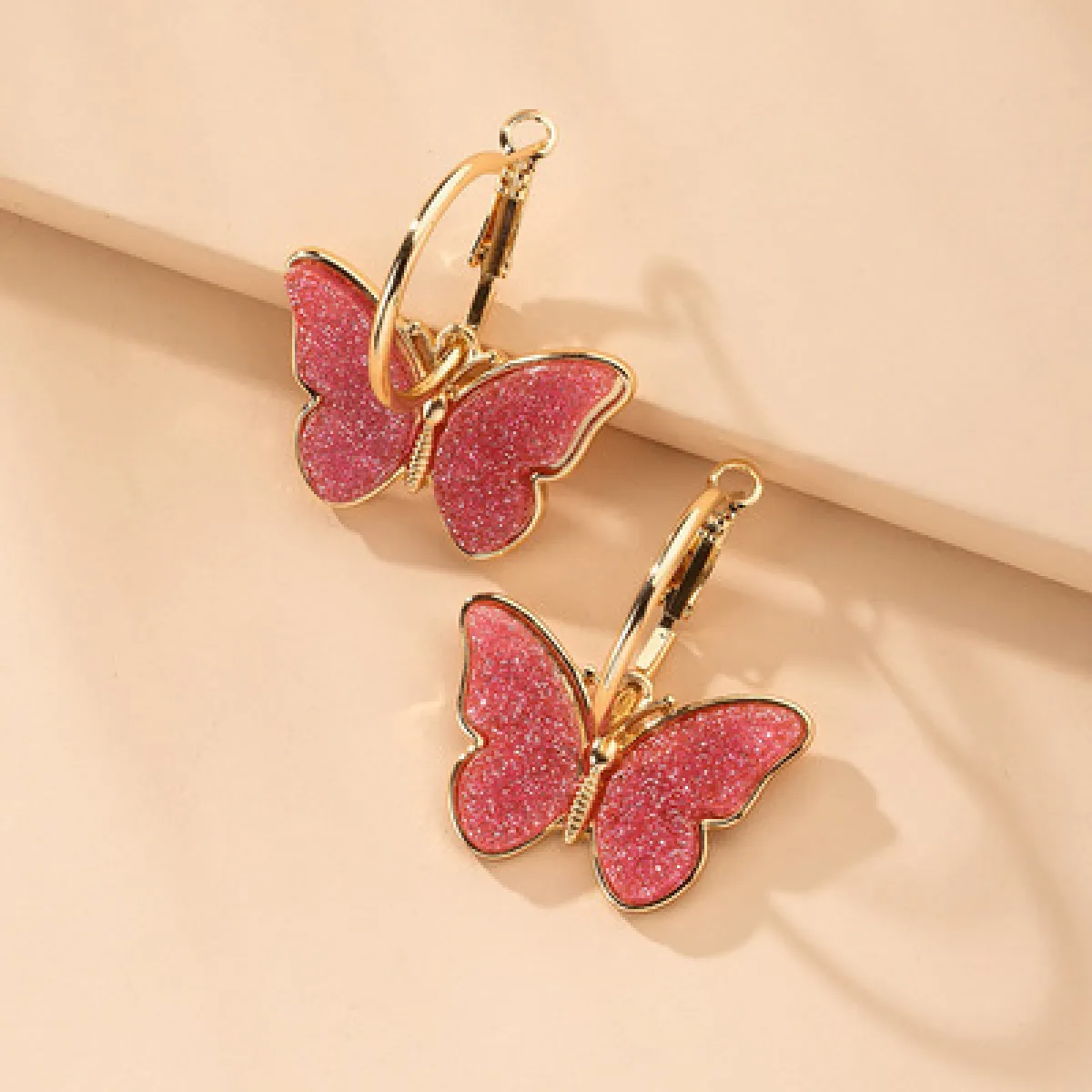 Women’s Butterfly Drop Earrings with Clear Wing Design and Hoop Style