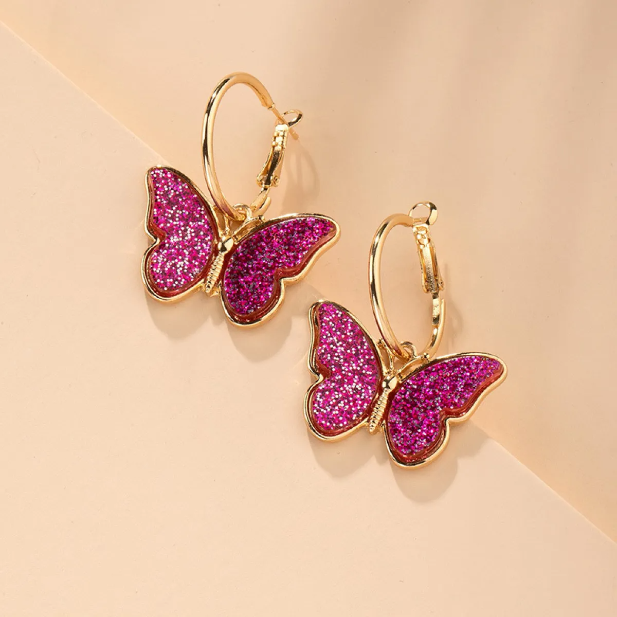 Women’s Butterfly Drop Earrings with Clear Wing Design and Hoop Style