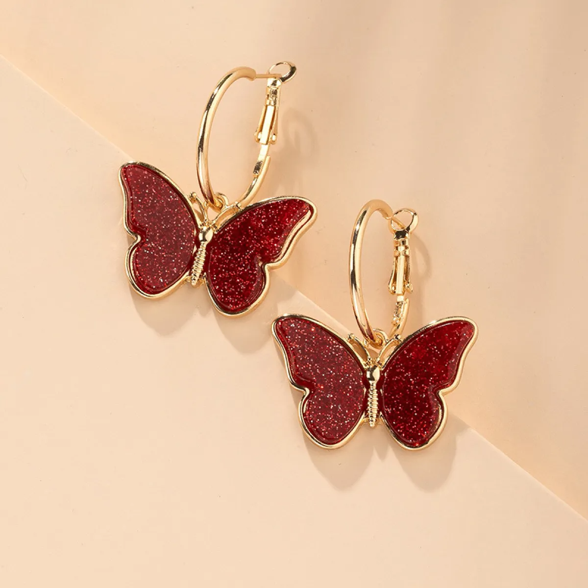 Women’s Butterfly Drop Earrings with Clear Wing Design and Hoop Style