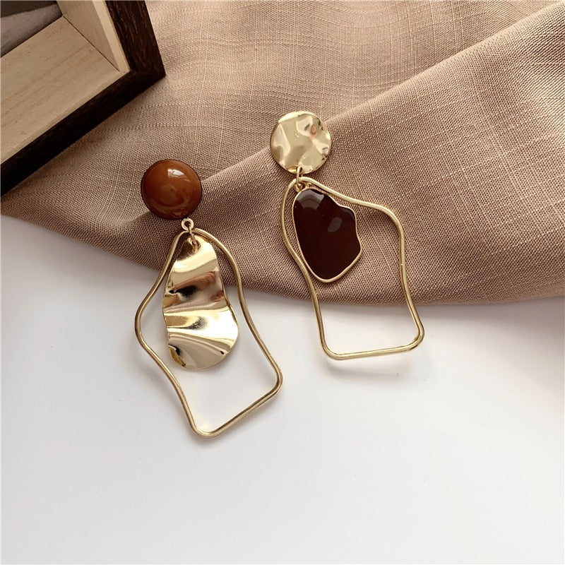 Rhia – Earrings with irregular hanging pendants