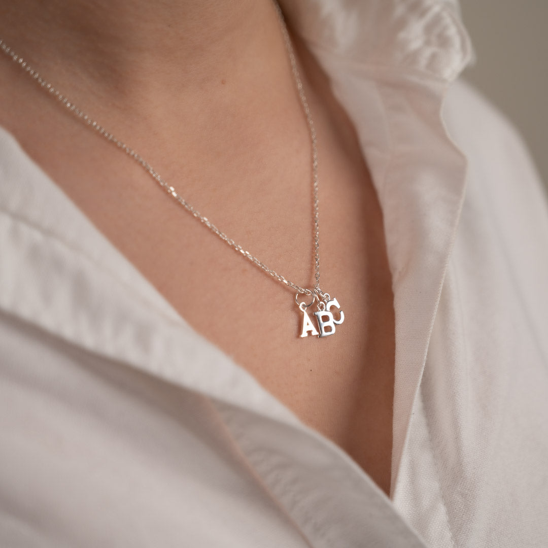 Nadia - Silver letter pendant