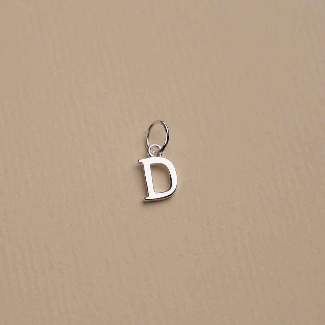 Nadia - Silver letter pendant