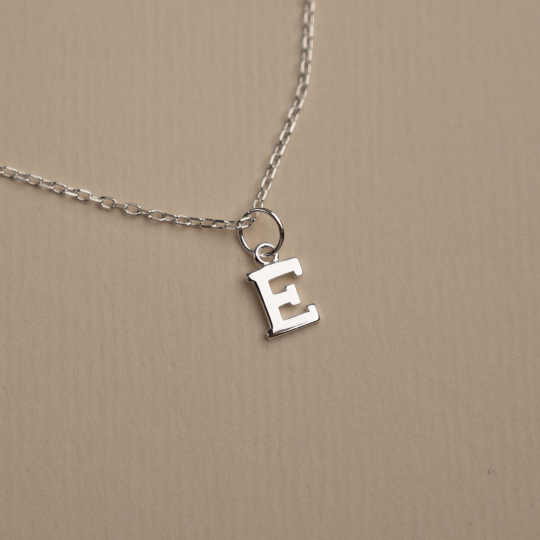 Nadia - Silver letter pendant