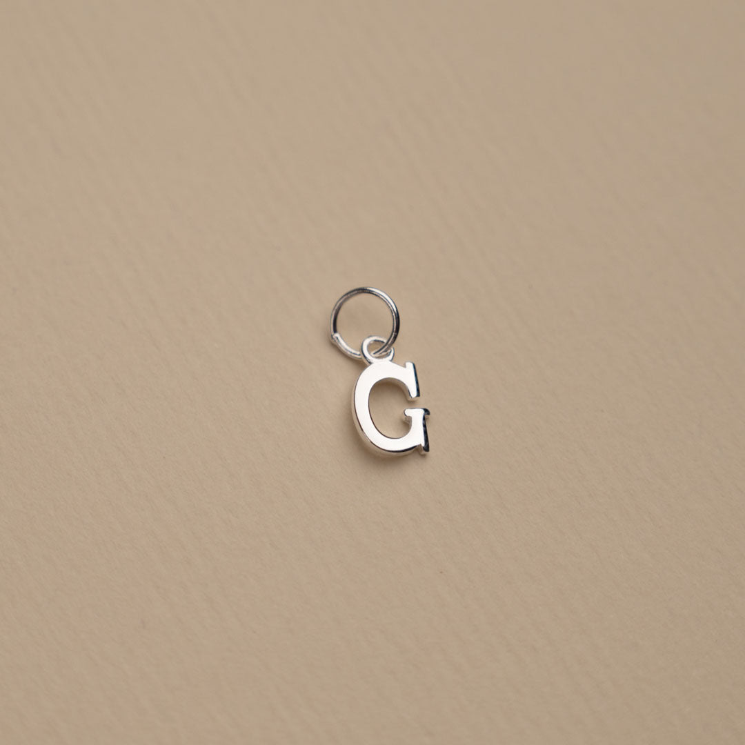 Nadia - Silver letter pendant