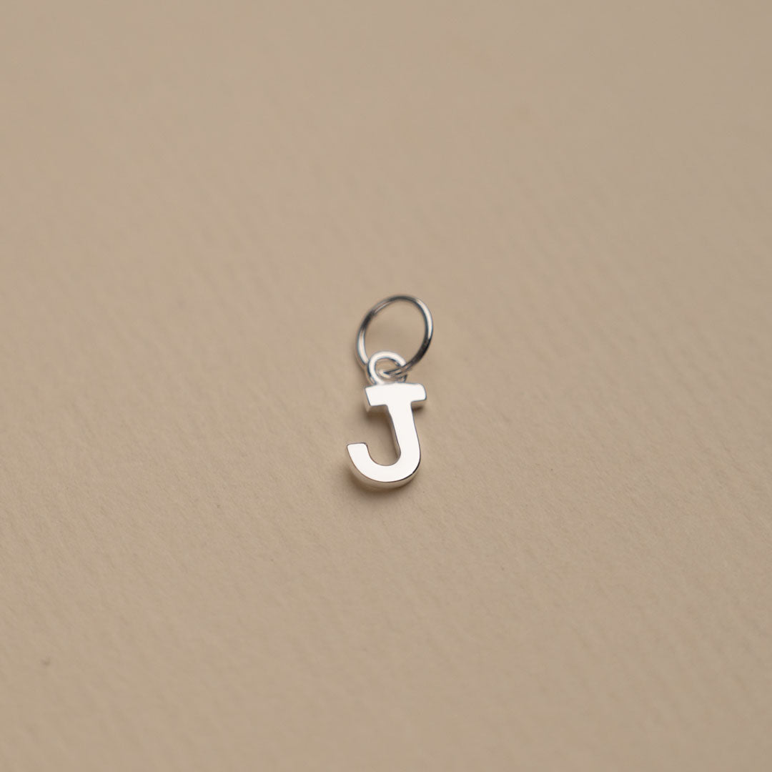 Nadia - Silver letter pendant