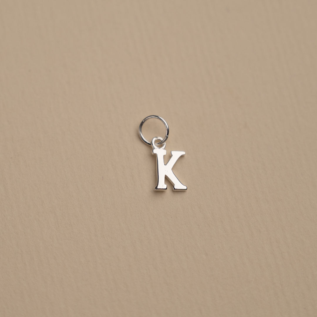 Nadia - Silver letter pendant