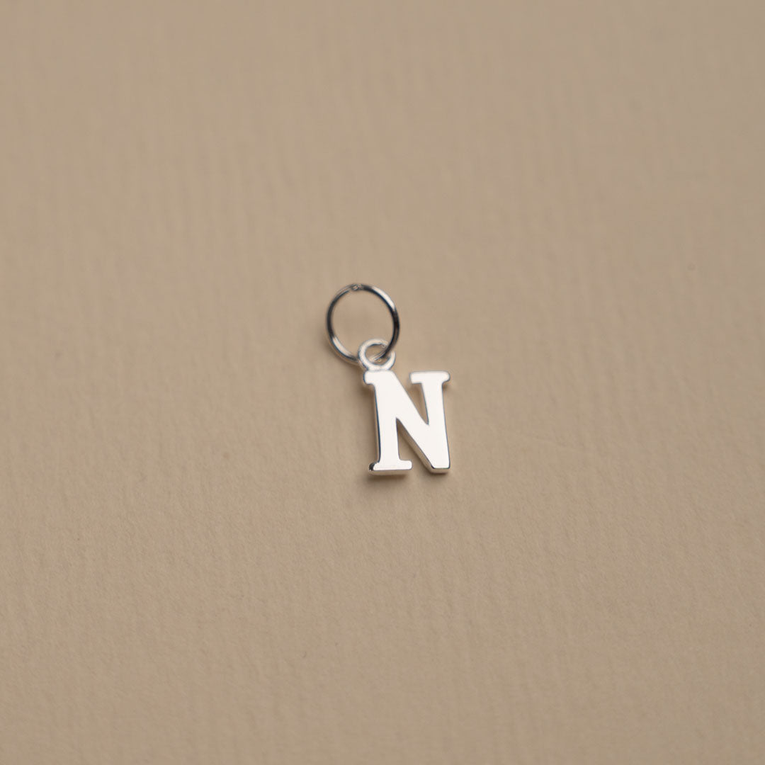 Nadia - Silver letter pendant