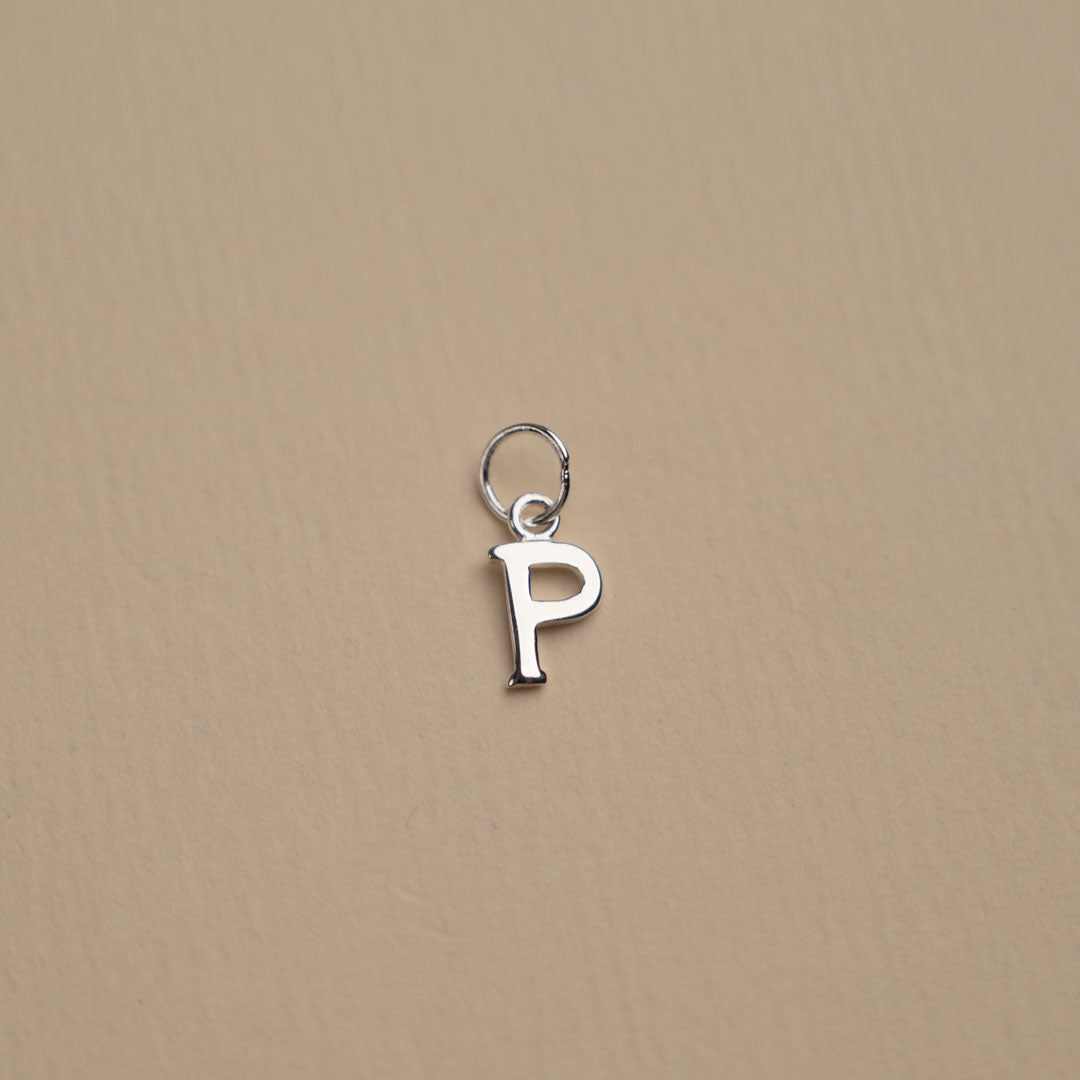 Nadia - Silver letter pendant