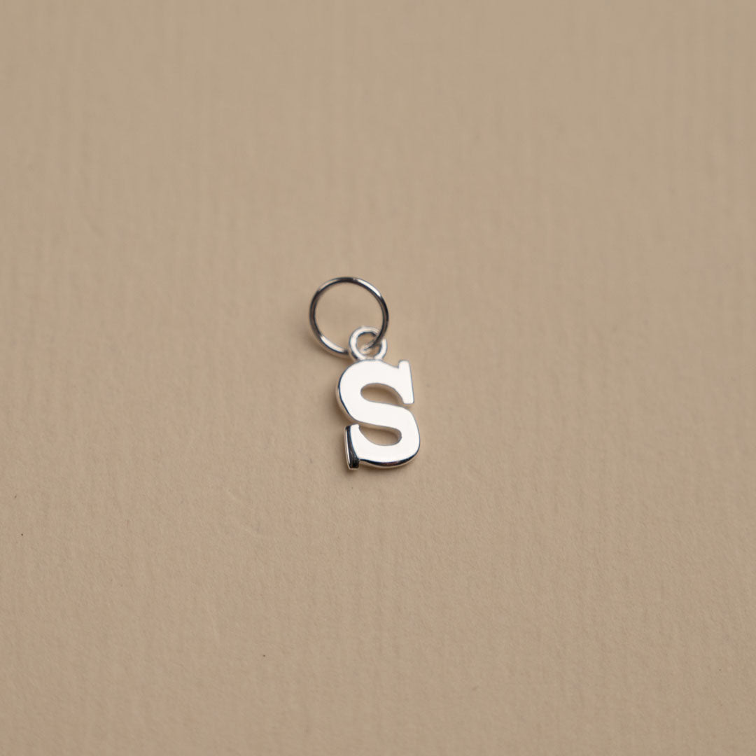 Nadia - Silver letter pendant