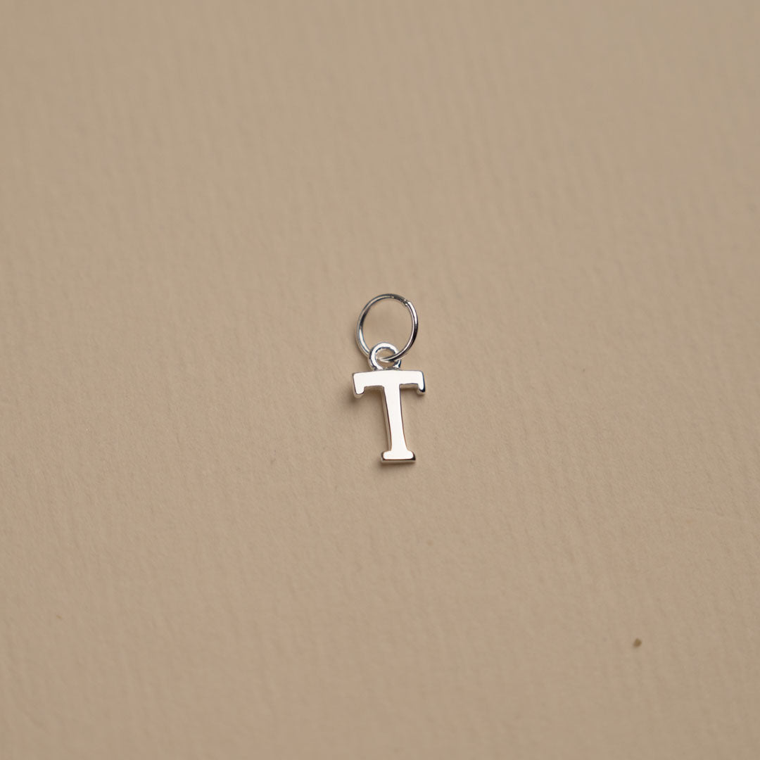 Nadia - Silver letter pendant