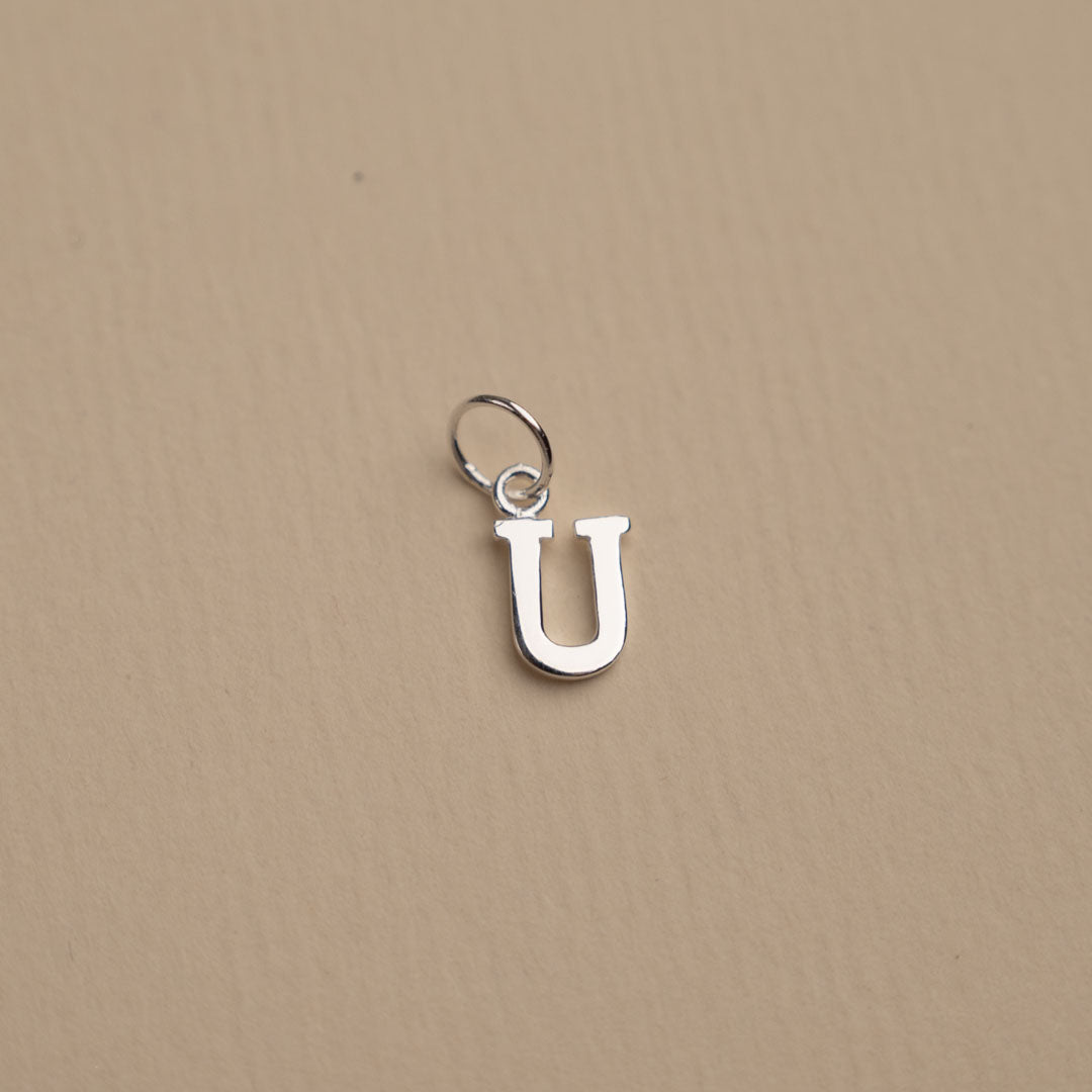Nadia - Silver letter pendant