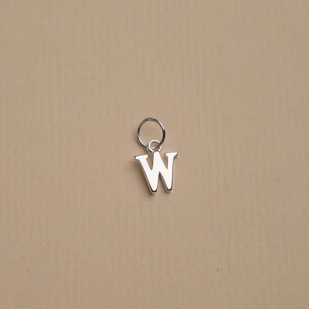 Nadia - Silver letter pendant
